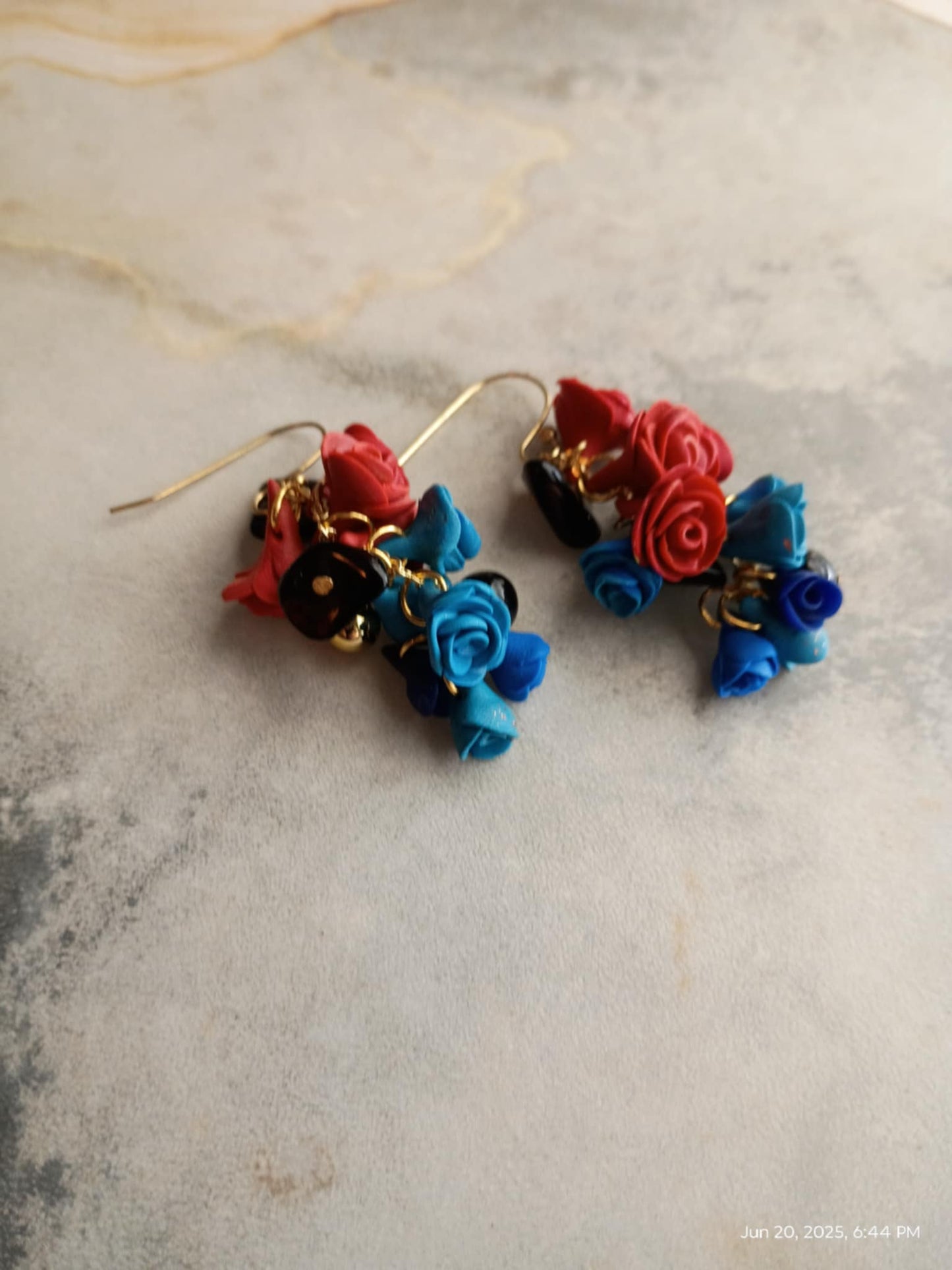 Orange, Blue, and Black Chandelier Roses